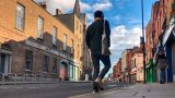 Image of a person walking along Meath Street. Image of a person walking along Meath Street.